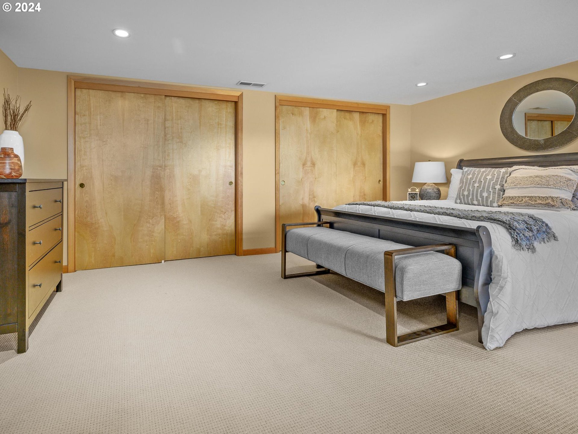 6435 Southwest Brugger Street Portland, OR 97219 - Photo 31 of 43 a bed room with a bed and a chair