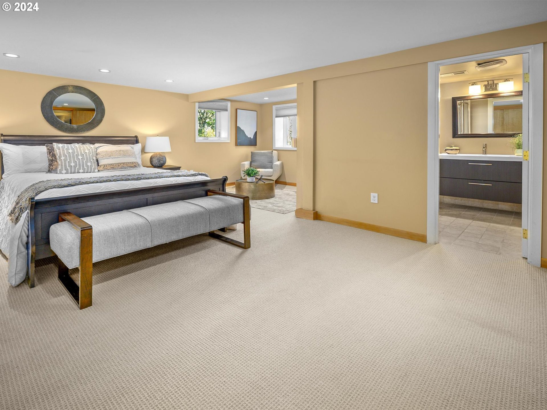 6435 Southwest Brugger Street Portland, OR 97219 - Photo 32 of 43 a bedroom with a bed and painting on the wall