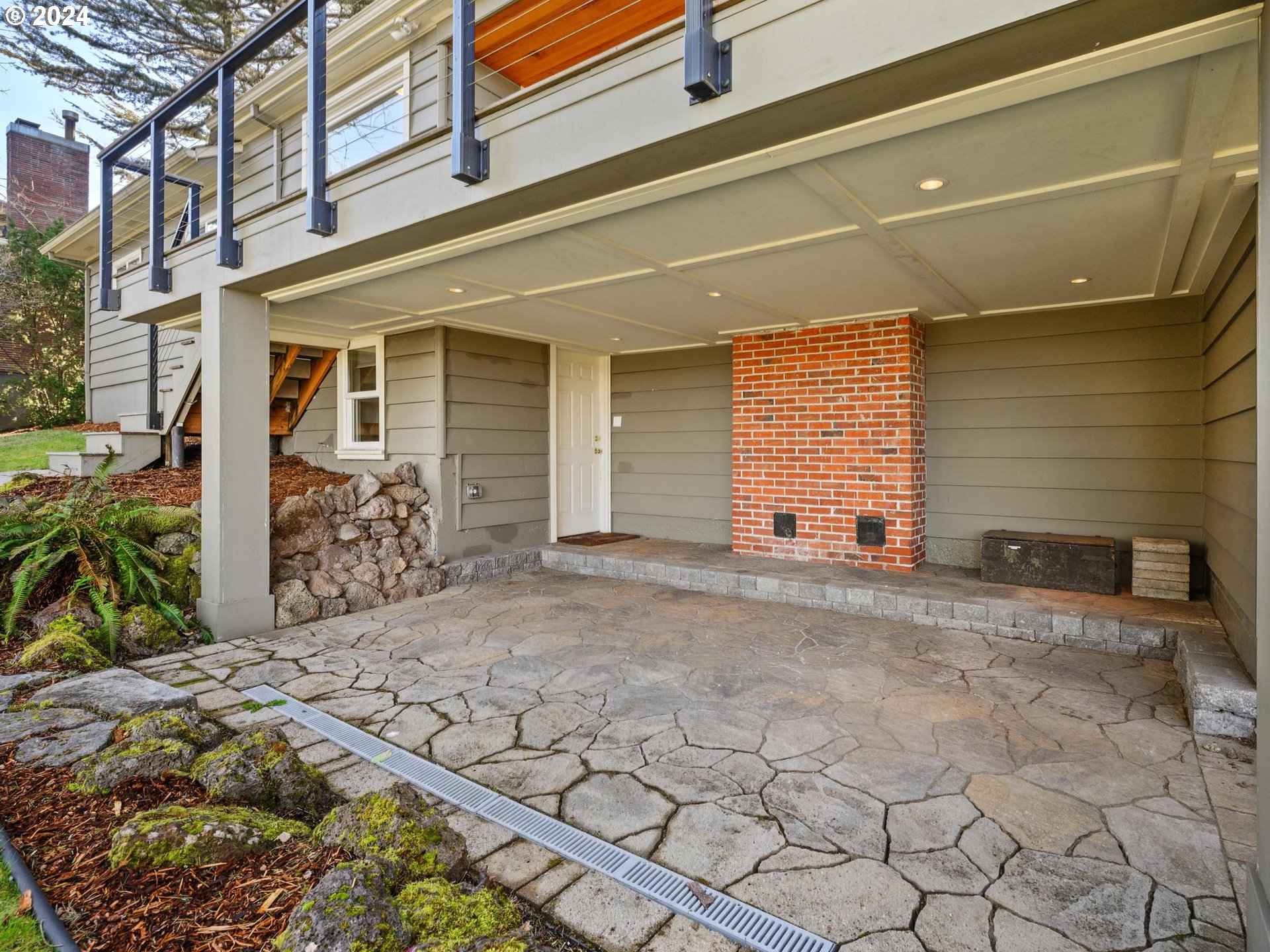 6435 Southwest Brugger Street Portland, OR 97219 - Photo 37 of 43 a view of a house with backyard