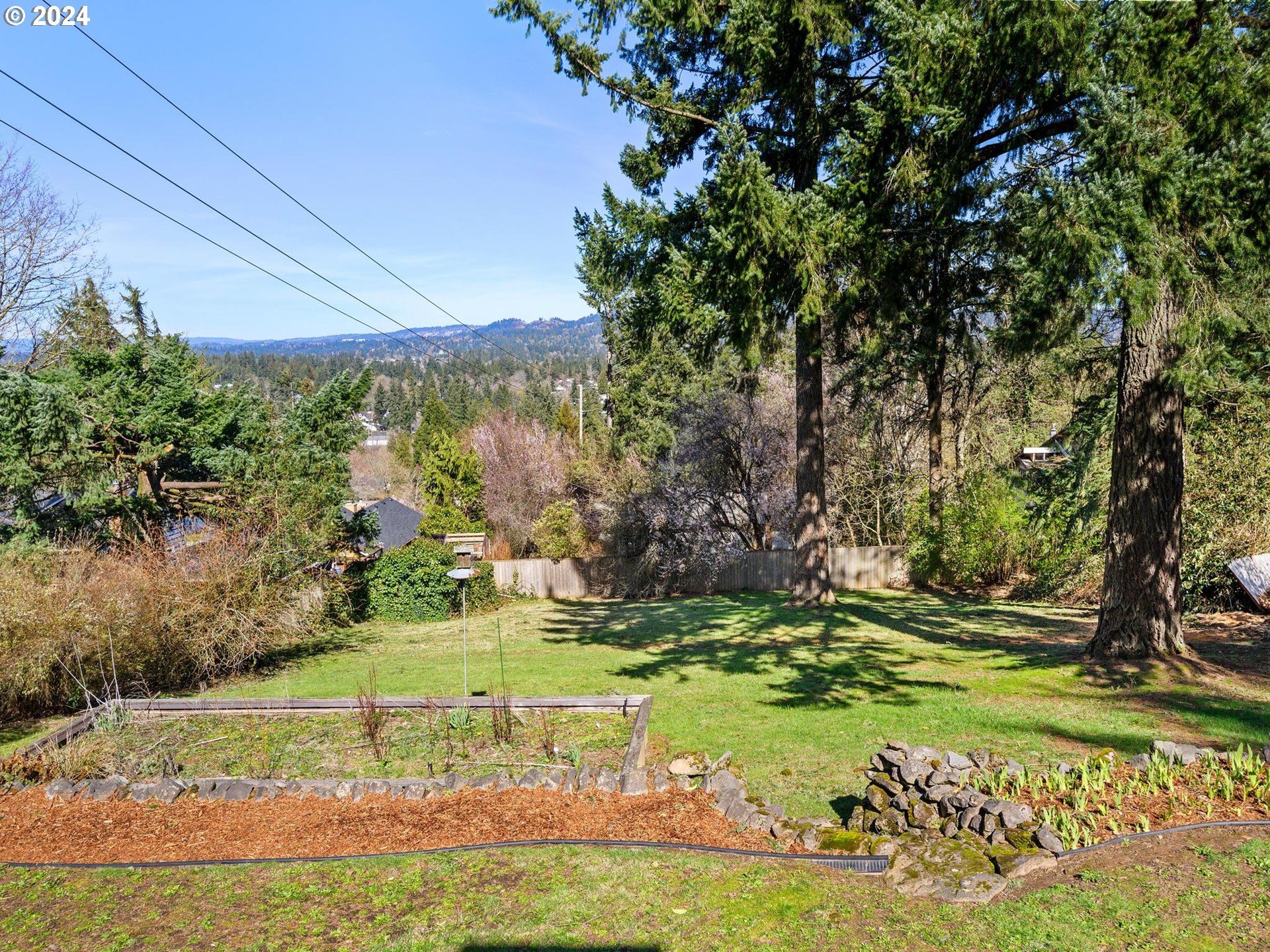 6435 Southwest Brugger Street Portland, OR 97219 - Photo 38 of 43 a view of a garden with an outdoor space