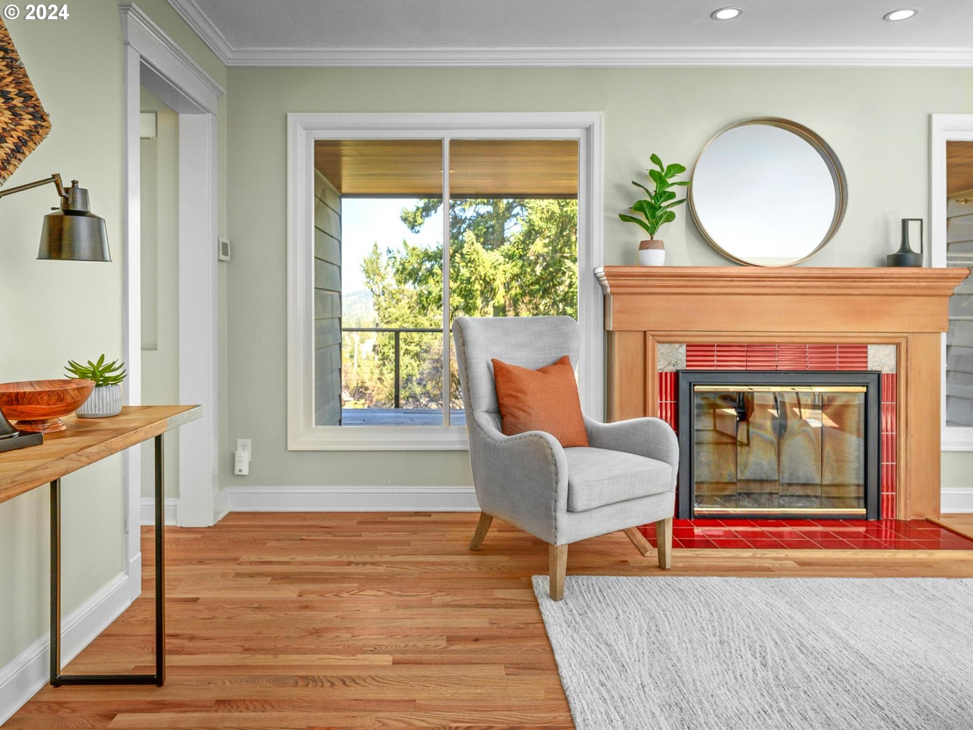 6435 Southwest Brugger Street Portland, OR 97219 - Photo 5 of 43 a living room with furniture and a fireplace