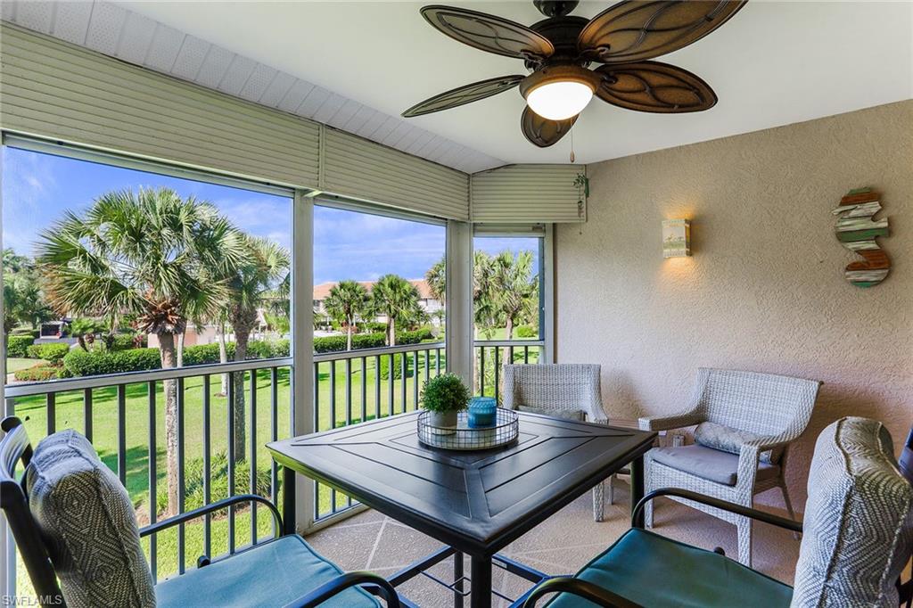 9022 Michael Circle, Unit 4 Naples, FL 34113 - Photo 4 of 28 a view of a dining room with furniture window and outside view