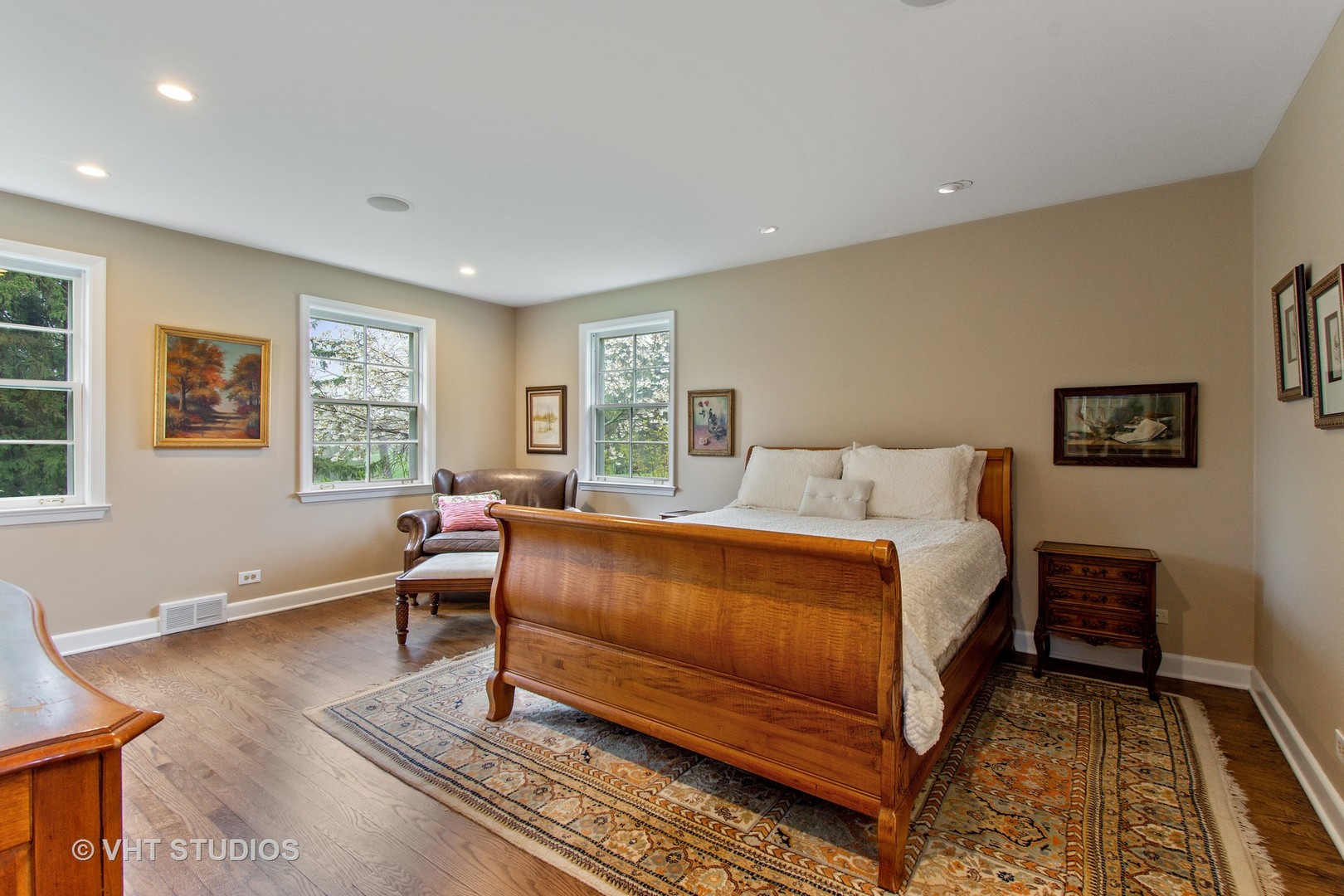 570 Aberdeen Road Inverness, IL 60067 - Photo 14 of 34 a bedroom with a bed and wooden floor