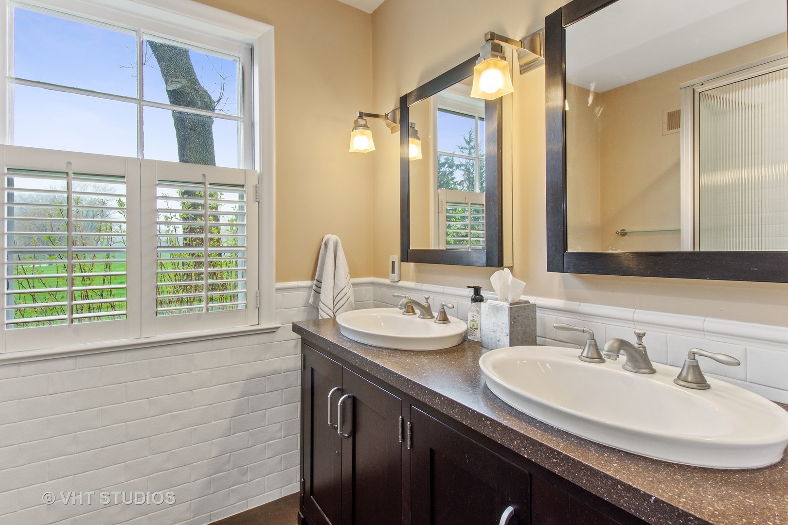 570 Aberdeen Road Inverness, IL 60067 - Photo 17 of 34 a bathroom with a sink and a mirror