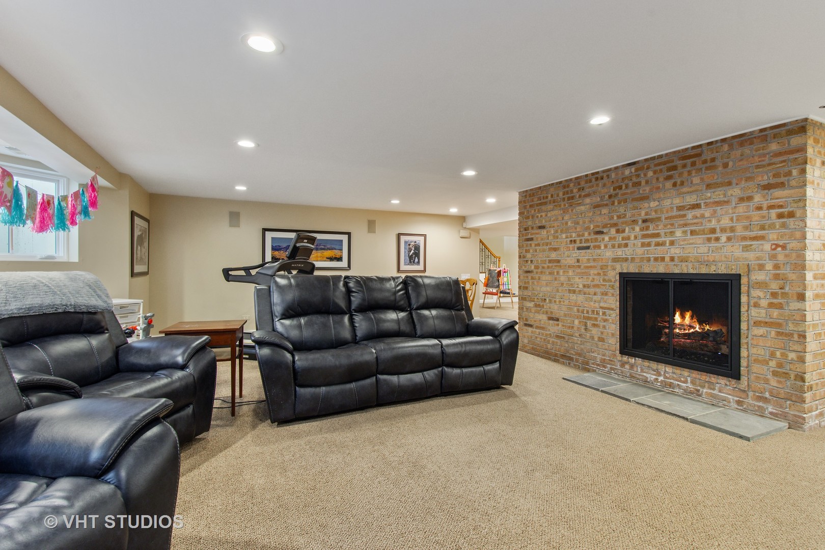 570 Aberdeen Road Inverness, IL 60067 - Photo 20 of 34 a living room with furniture and a fireplace