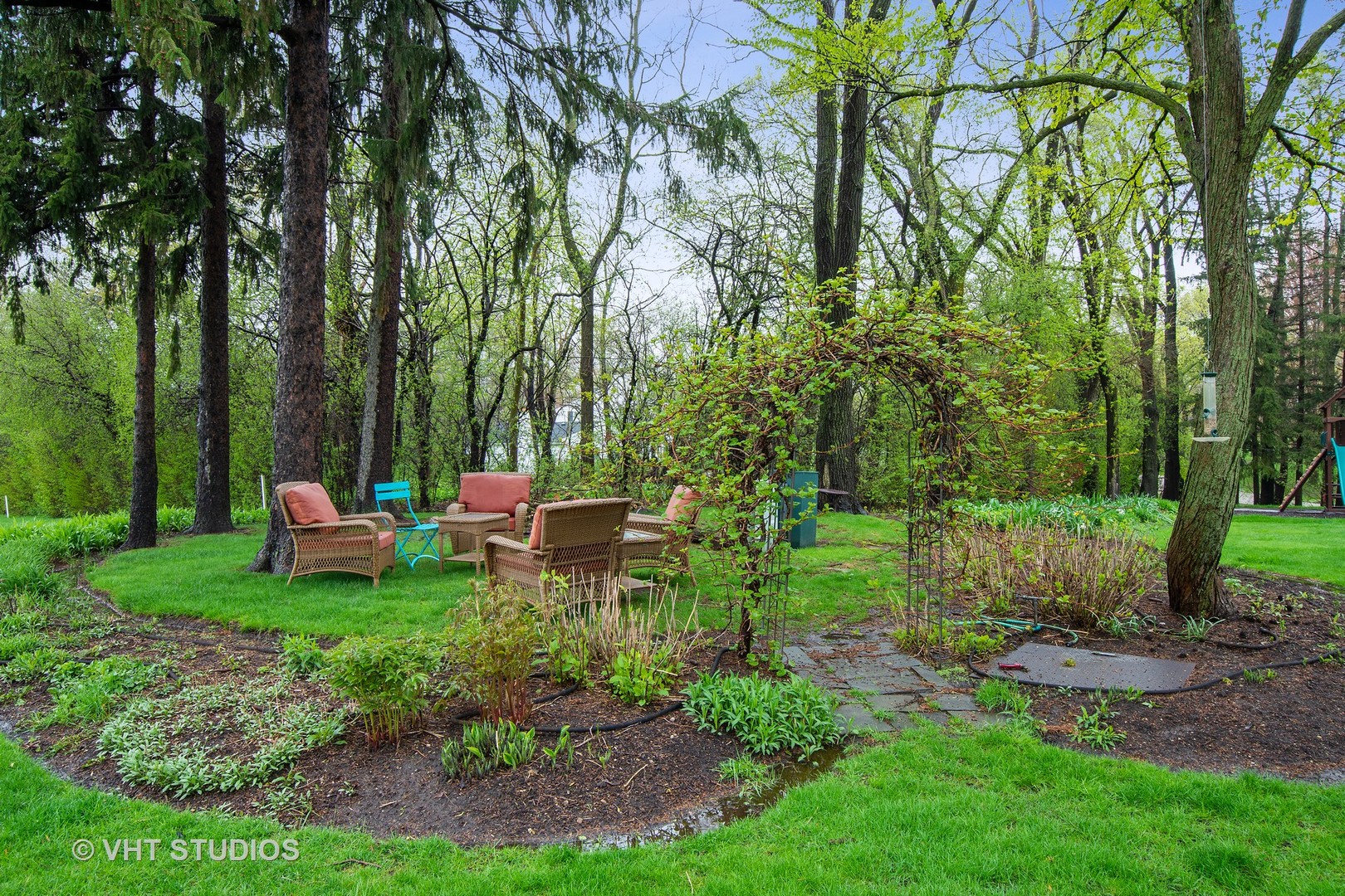 570 Aberdeen Road Inverness, IL 60067 - Photo 26 of 34 a view of a chair and table in the garden
