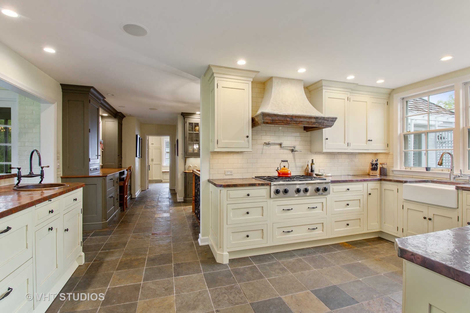 570 Aberdeen Road Inverness, IL 60067 - Photo 6 of 34 a large kitchen with stainless steel appliances kitchen island granite countertop a large stove a sink and a refrigerator