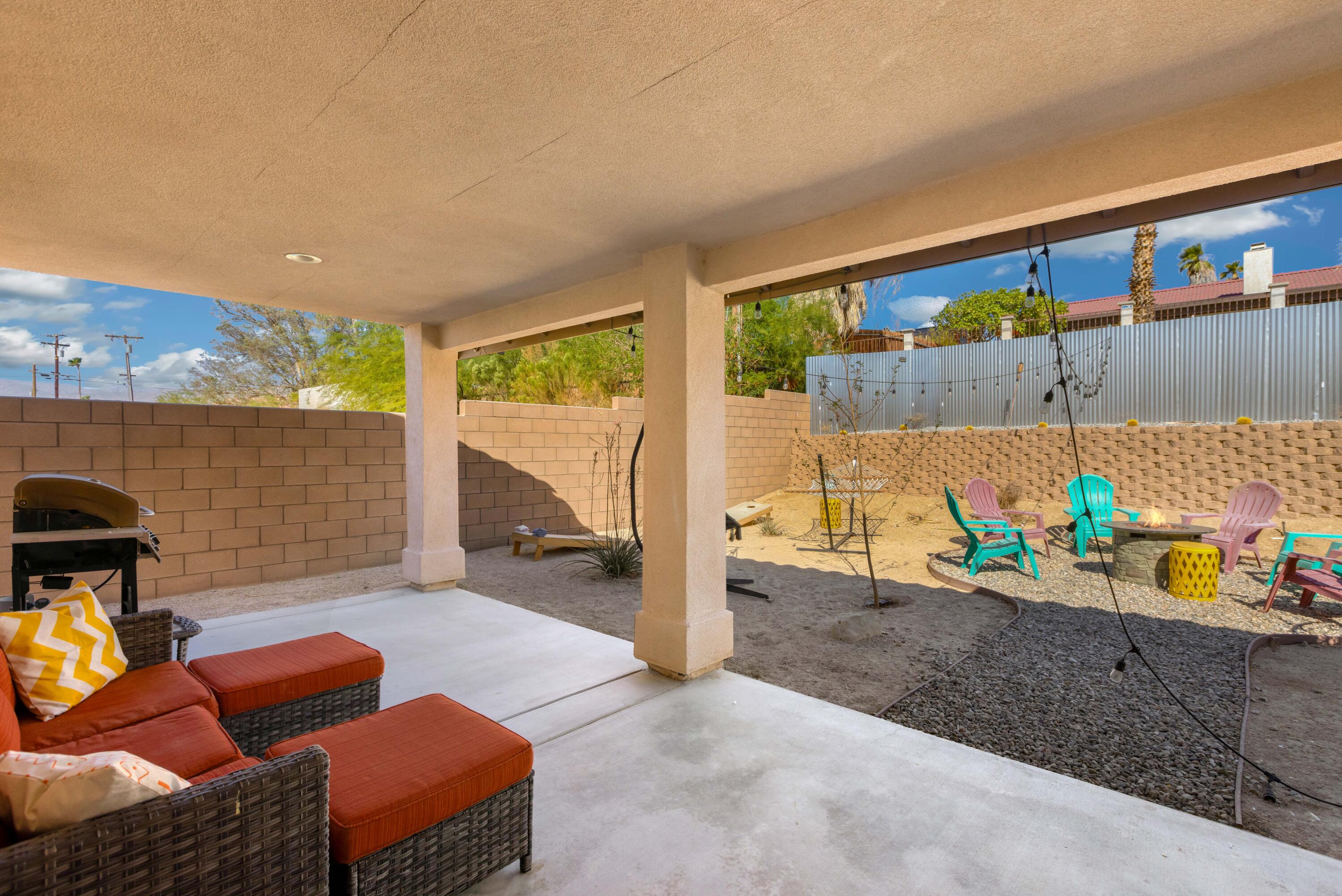 66560 Ocotillo Road Desert Hot Springs, CA 92240 - Photo 26 of 34 Covered patio seating area