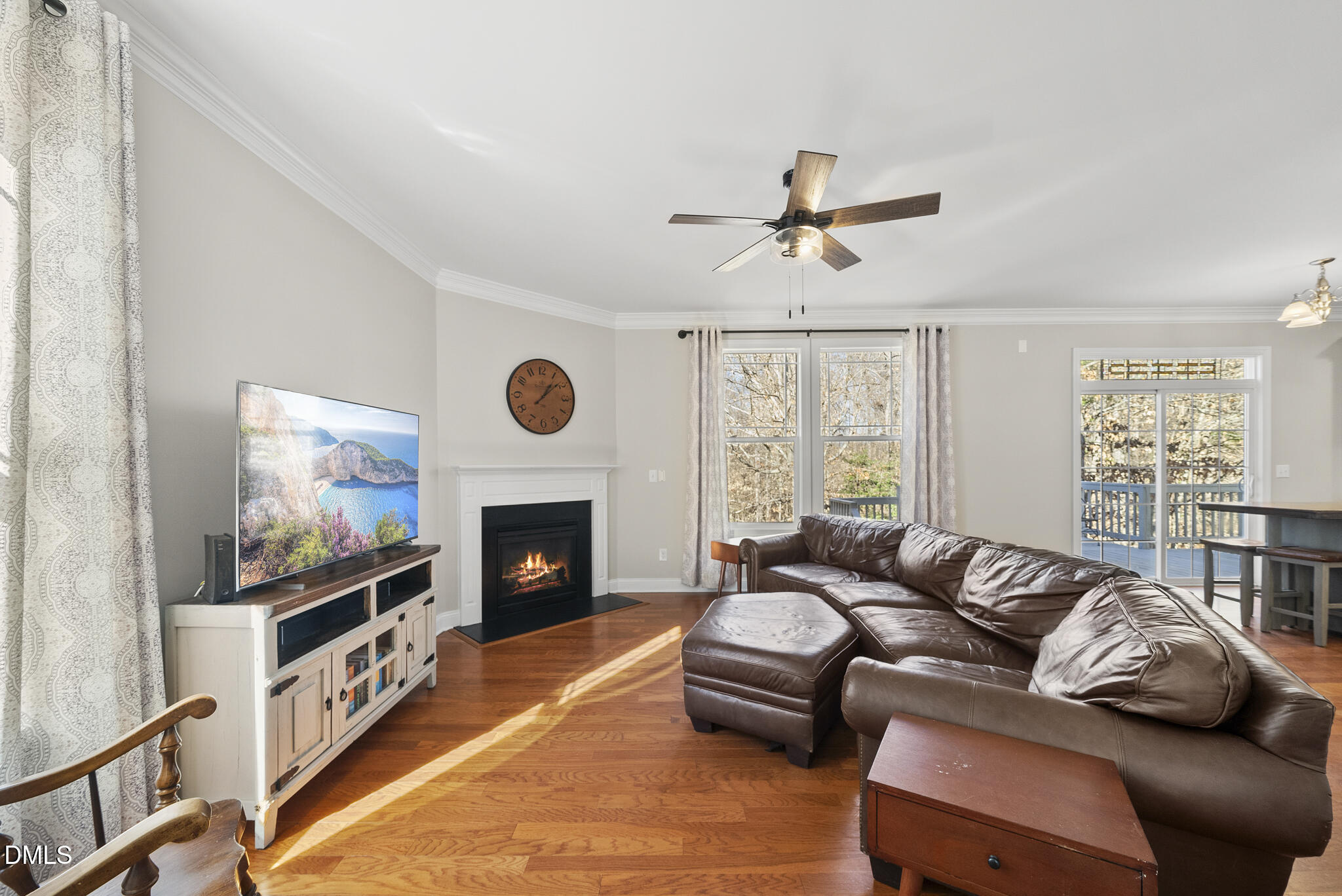2731 Hidden Waters Circle Raleigh, NC 27614 - Photo 14 of 58 a living room with furniture and a fireplace