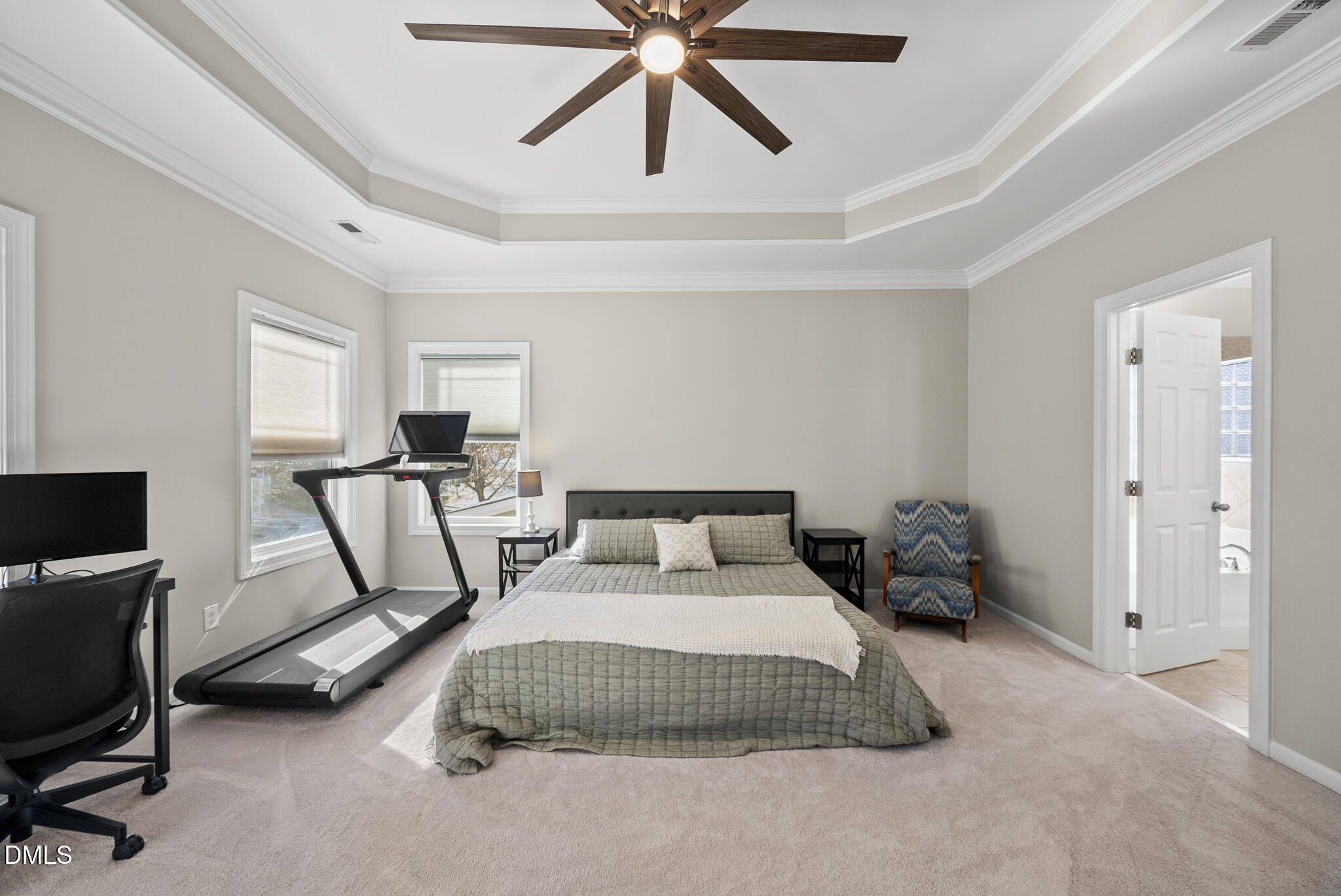 2731 Hidden Waters Circle Raleigh, NC 27614 - Photo 24 of 58 a bedroom with a bed and a chandelier