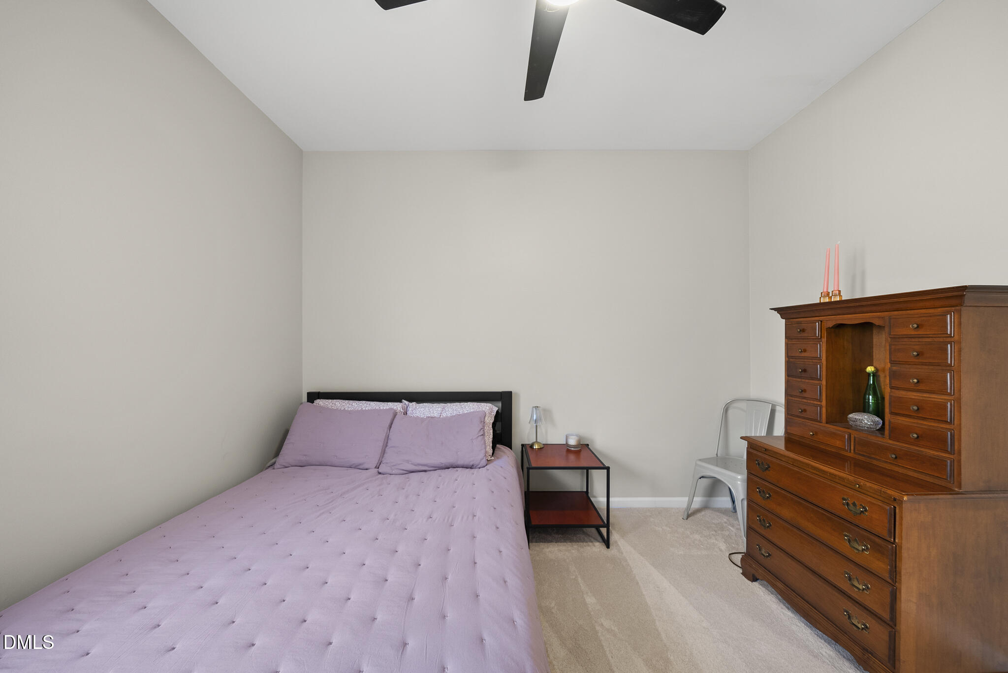 2731 Hidden Waters Circle Raleigh, NC 27614 - Photo 31 of 58 a bedroom with a bed and dresser