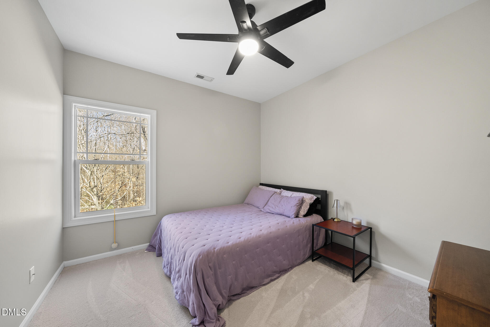 2731 Hidden Waters Circle Raleigh, NC 27614 - Photo 32 of 58 a bedroom with a bed and a window