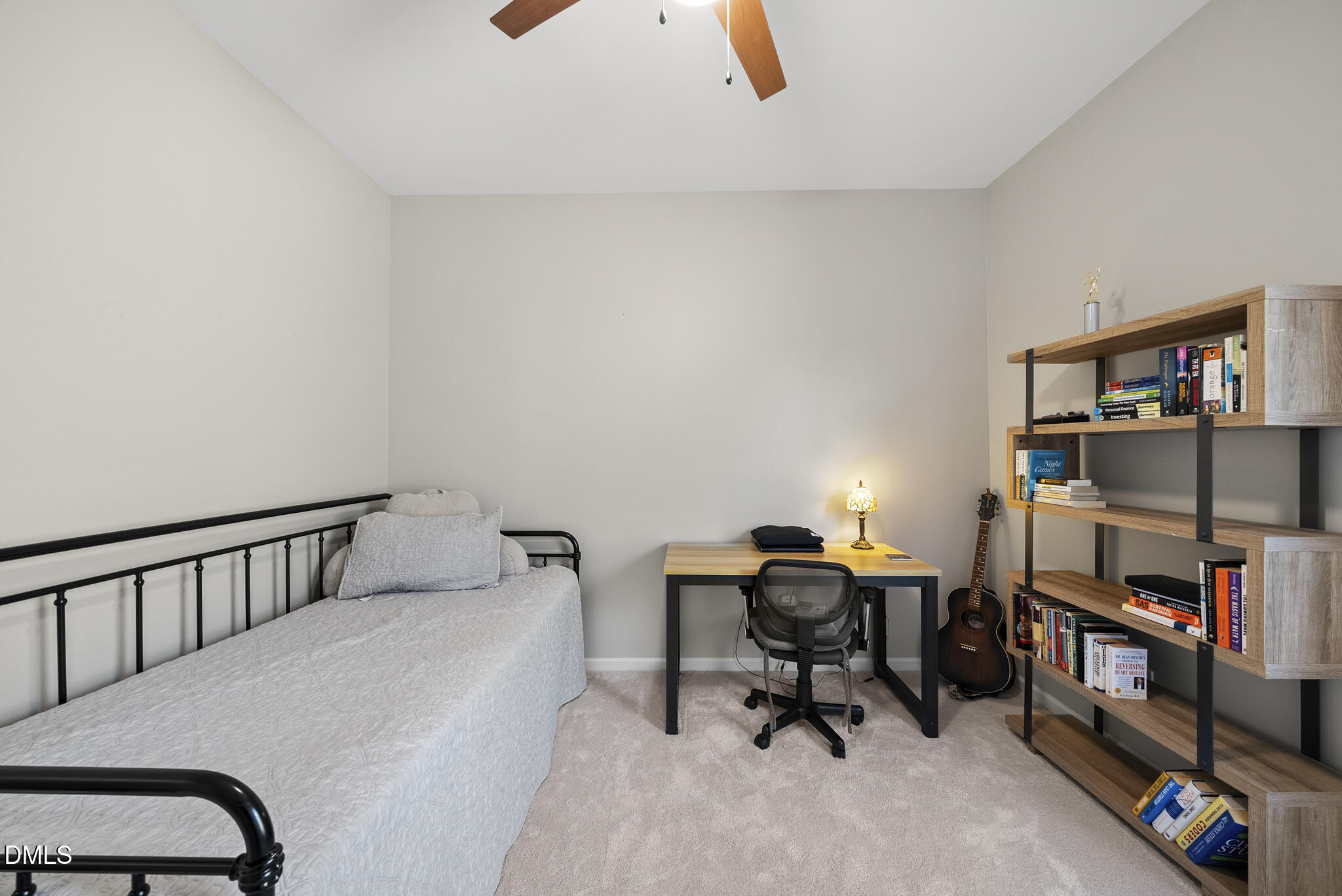 2731 Hidden Waters Circle Raleigh, NC 27614 - Photo 33 of 58 a workspace with furniture and a book shelf