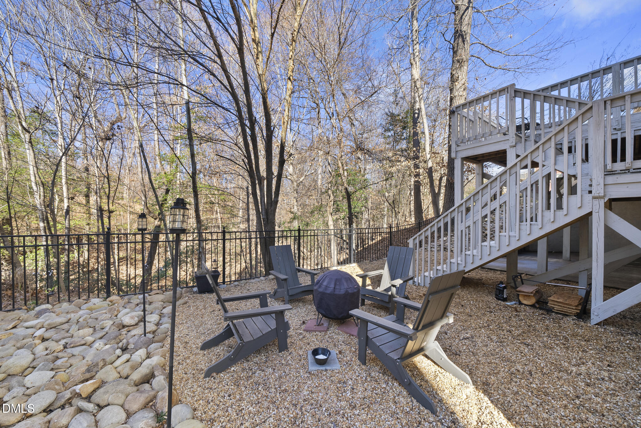 2731 Hidden Waters Circle Raleigh, NC 27614 - Photo 41 of 58 a view of a roof deck with wooden fence and a couple of chairs