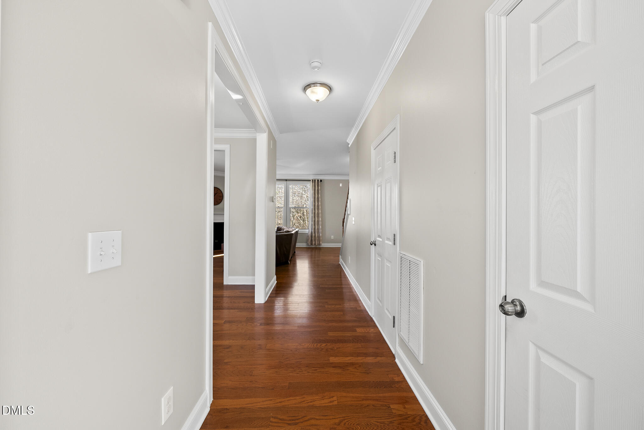 2731 Hidden Waters Circle Raleigh, NC 27614 - Photo 7 of 58 a view of a hallway with wooden floor
