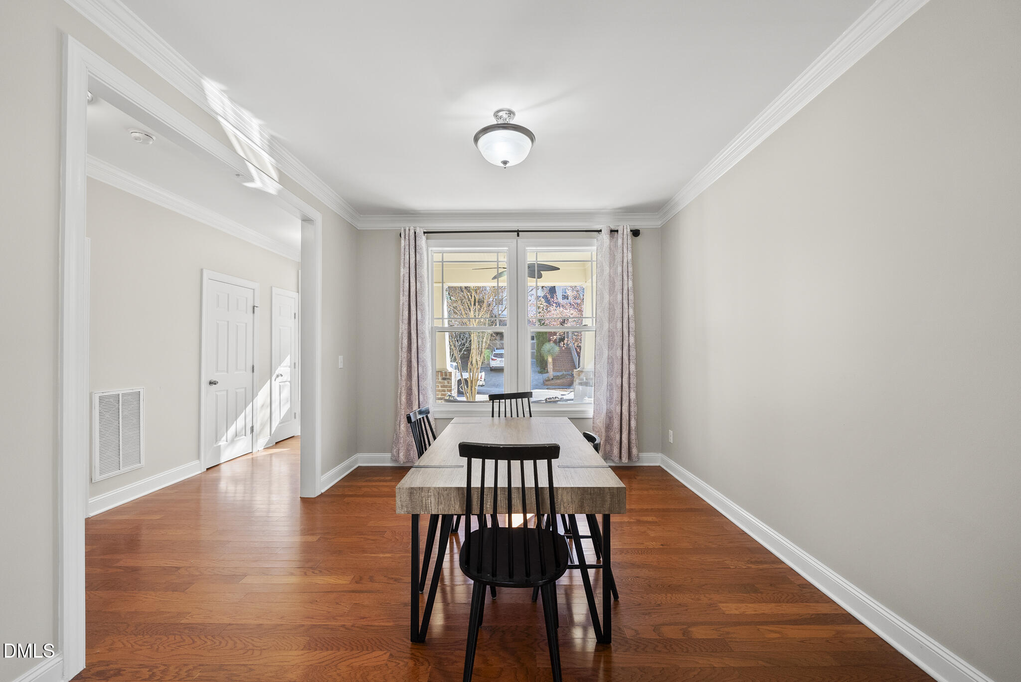 2731 Hidden Waters Circle Raleigh, NC 27614 - Photo 8 of 58 a view of a dining room with furniture window and wooden floor