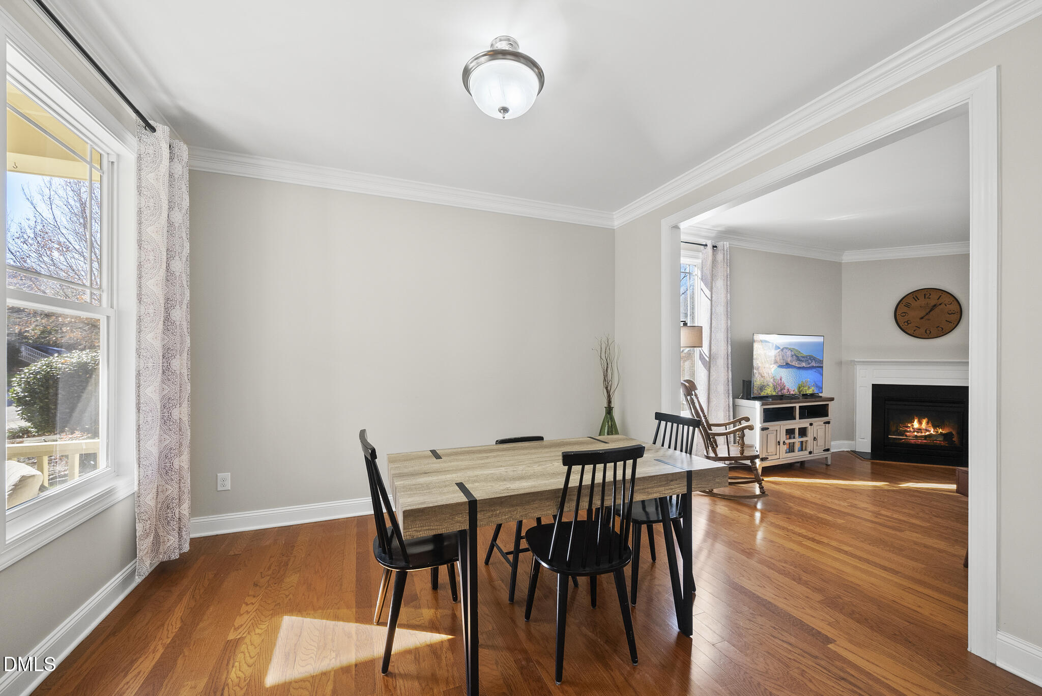 2731 Hidden Waters Circle Raleigh, NC 27614 - Photo 10 of 58 a view of a dining room with furniture window and wooden floor