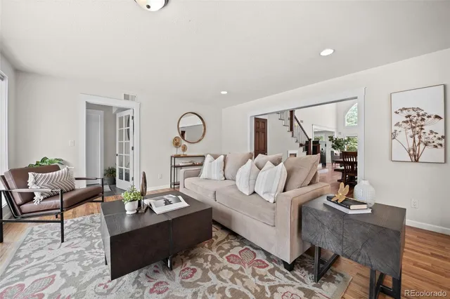 a aerial view of a house with a yard and a garden