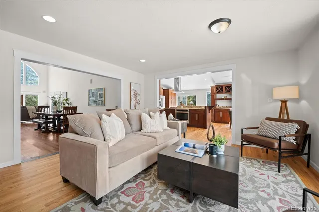 a view of a lush green hillside and houses