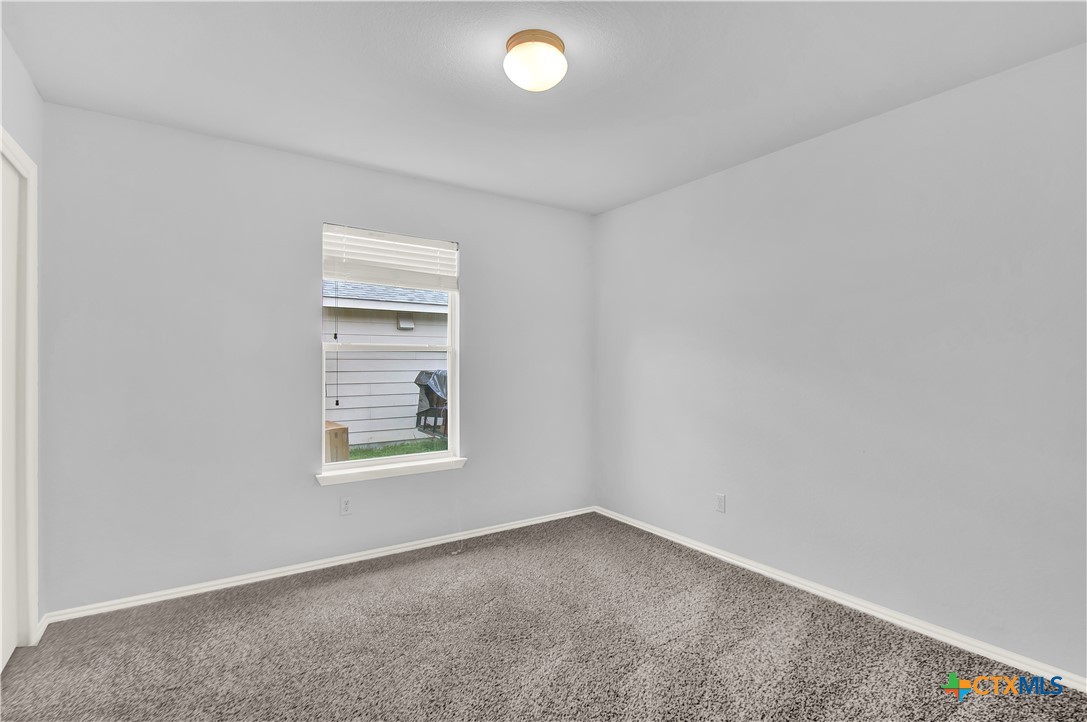 117 Bashaw Loop Temple, TX 76502 - Photo 18 of 20 an empty room with a window