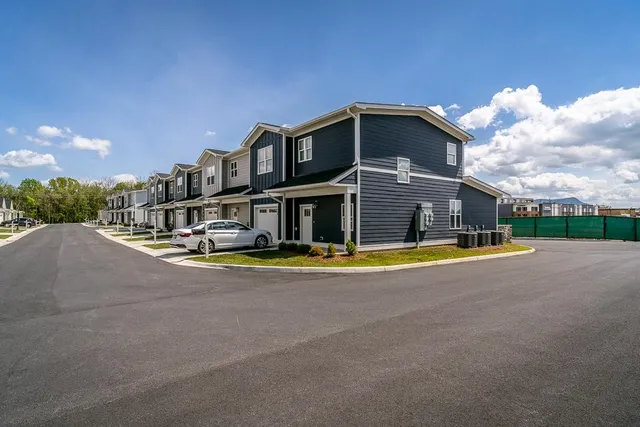 a view of a house with a swimming pool