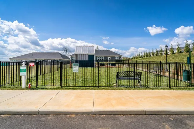 a view of a house with backyard porch and patio