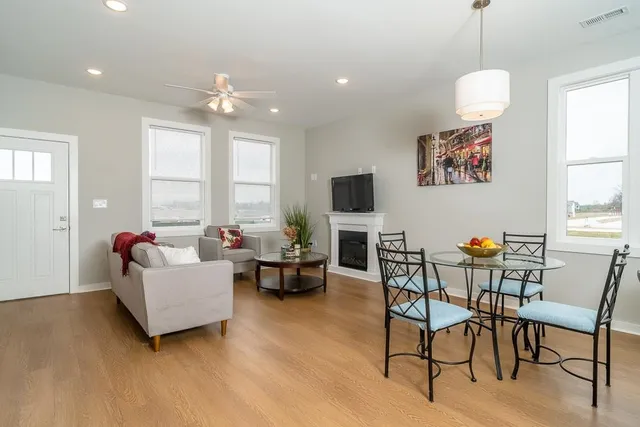 a living room with furniture and a window