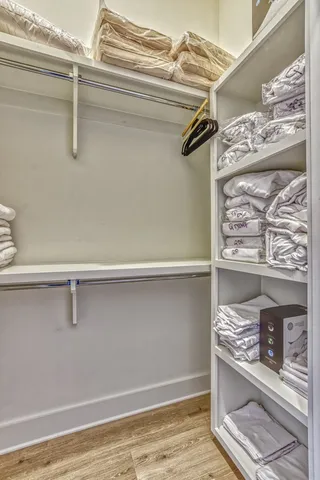 a bathroom with a shower and a sink