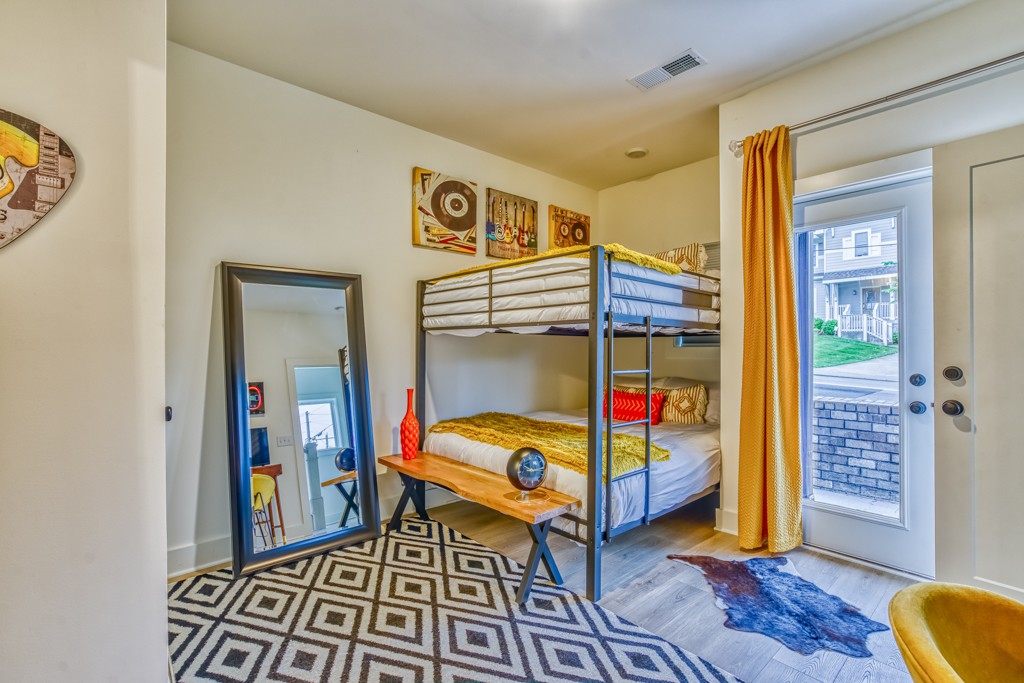 1519 Meridian Street, Unit 3 Nashville, TN 37207 - Photo 30 of 61 a bedroom with bed and a window