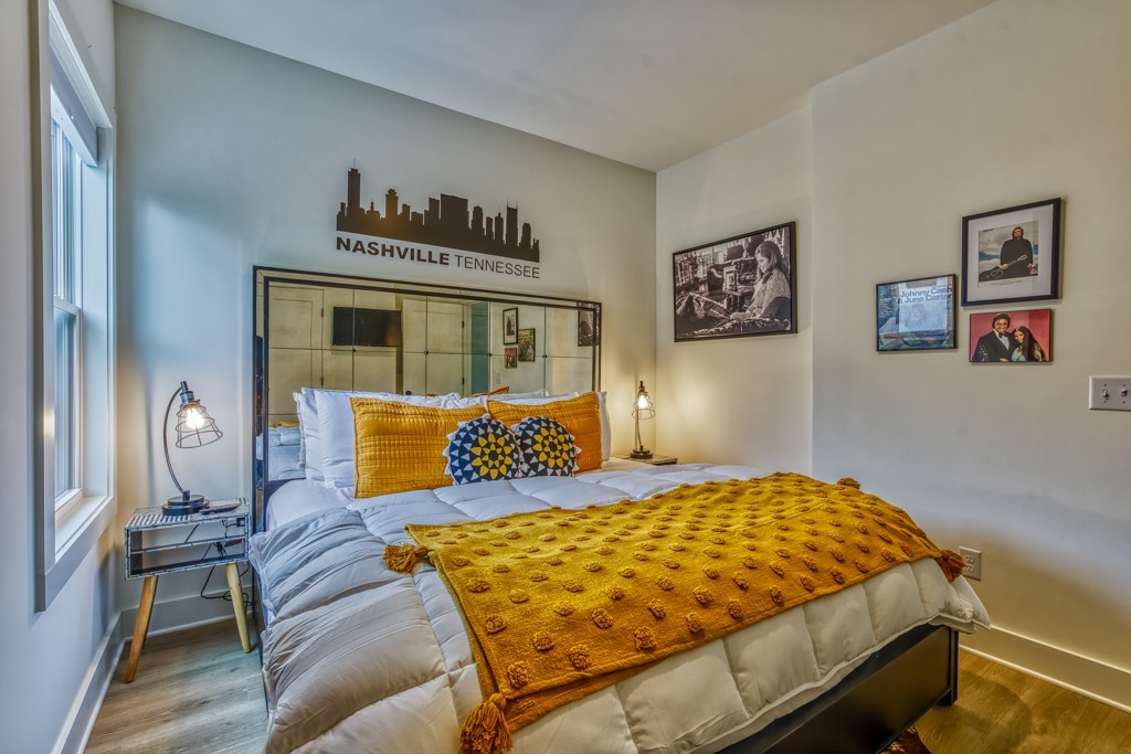 1519 Meridian Street, Unit 3 Nashville, TN 37207 - Photo 36 of 61 a bedroom with a bed and cupboard