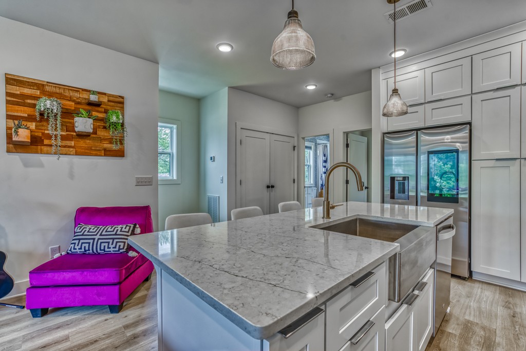1519 Meridian Street, Unit 3 Nashville, TN 37207 - Photo 44 of 61 a view of kitchen island with granite countertop living room