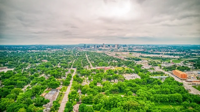 a sign that is on a brick wall