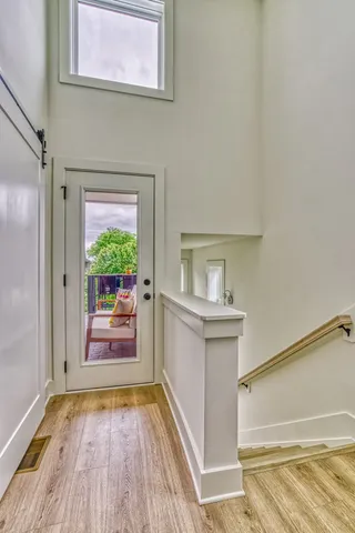 a bedroom with a bed and a mirror