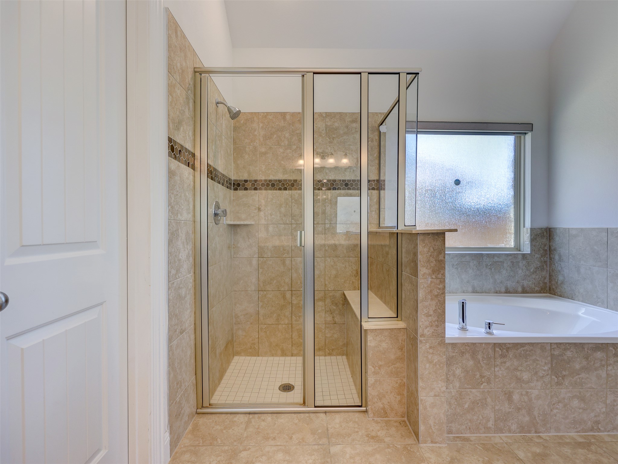 2020 Base Burner Path Leander, TX 78641 - Photo 11 of 22 Bathroom with a bath, a stall shower, and tile patterned flooring