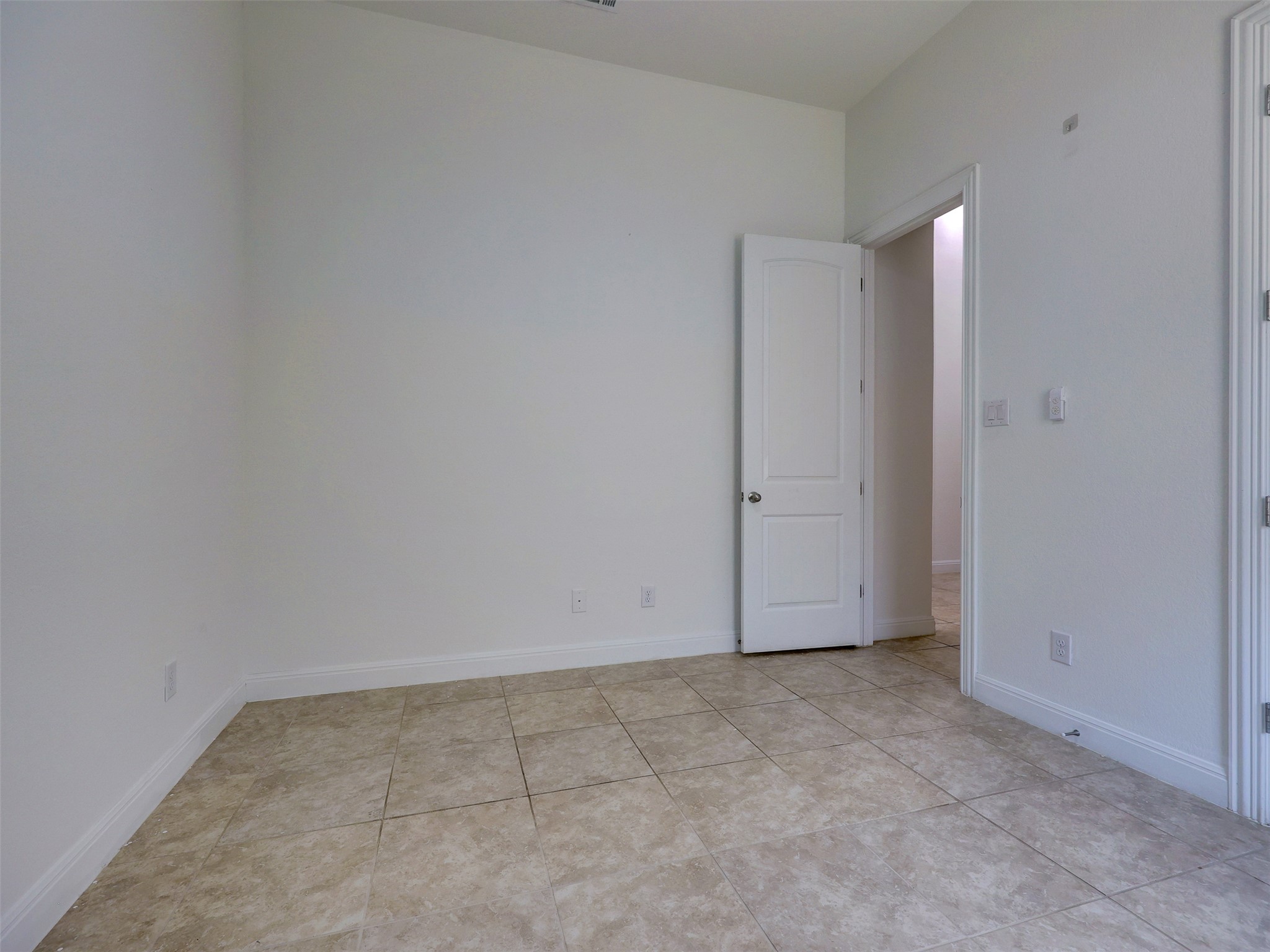 2020 Base Burner Path Leander, TX 78641 - Photo 15 of 22 Empty room featuring baseboards and light tile patterned flooring