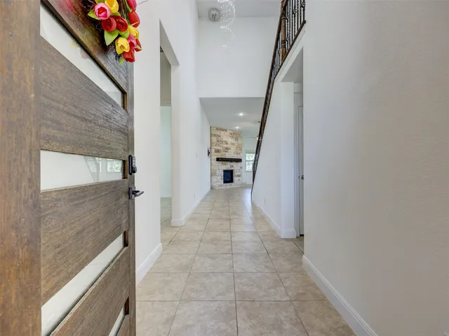 a view of a kitchen with a stove cabinets and a fireplace
