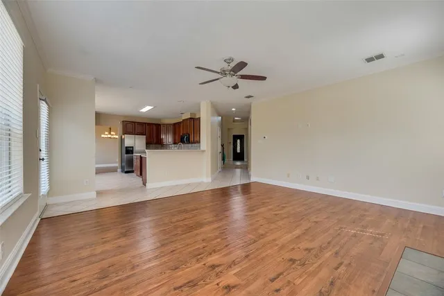 a kitchen with a stove sink and microwave