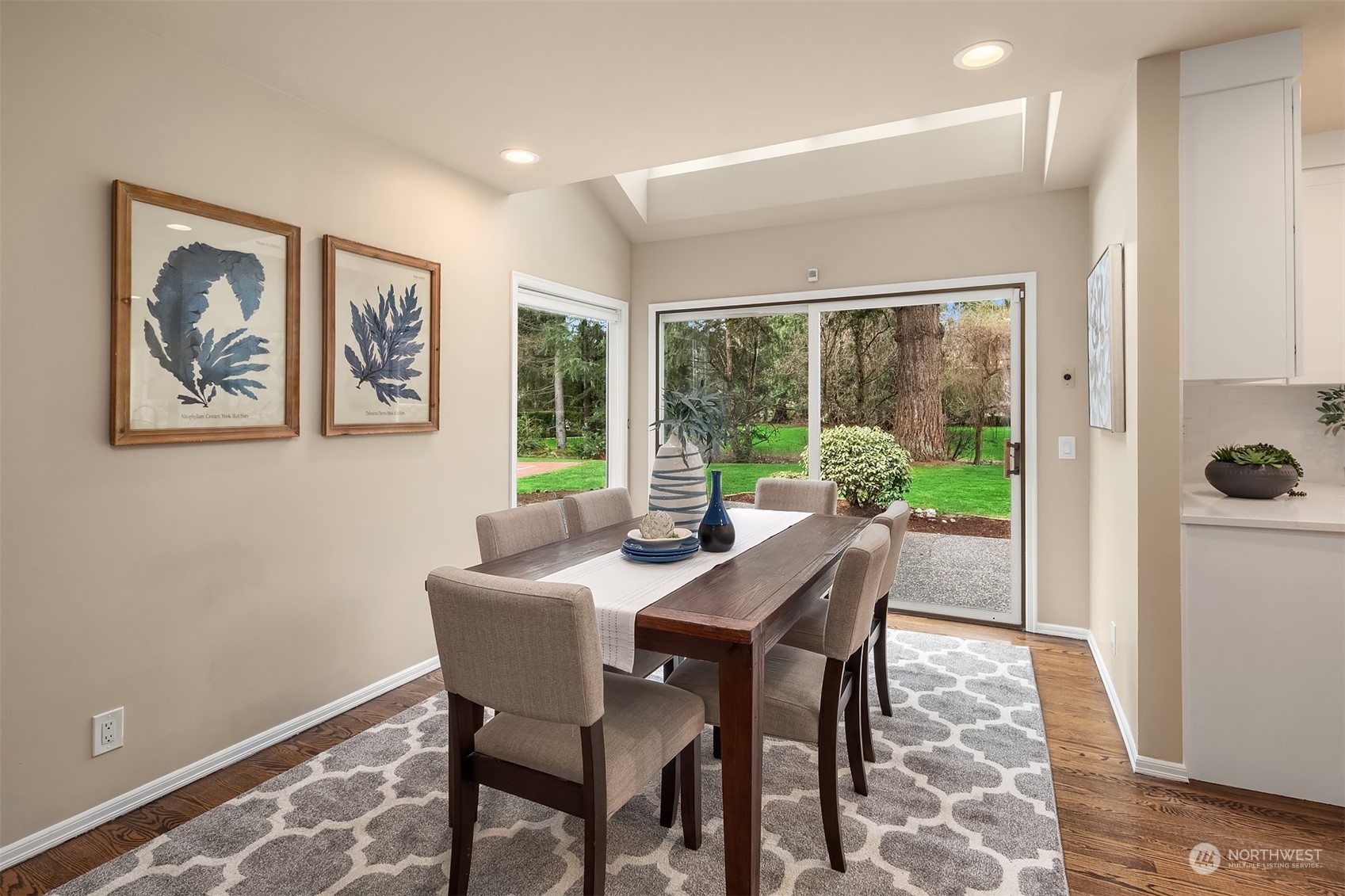 15425 192nd Court Northeast Woodinville, WA 98072 - Photo 14 of 33 a view of a dining room with furniture window and outside view