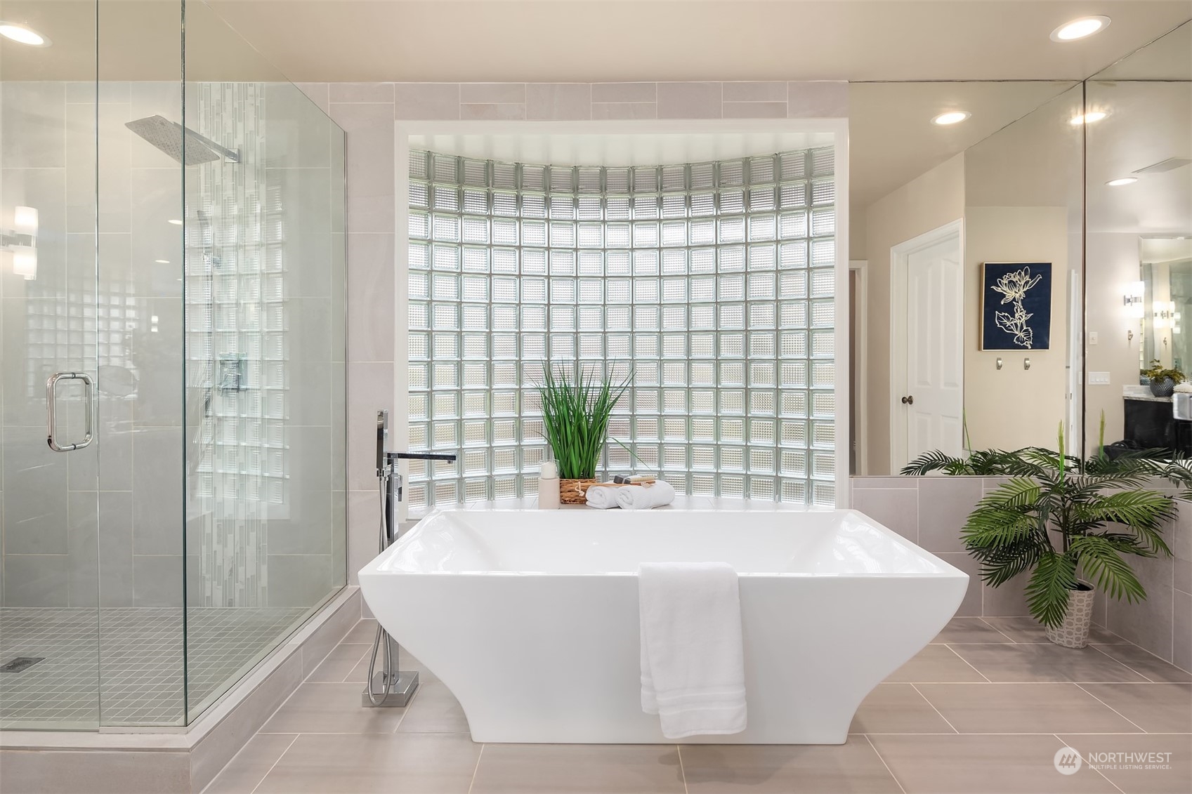 15425 192nd Court Northeast Woodinville, WA 98072 - Photo 21 of 33 a bath tub sitting in a bathroom next to a tub