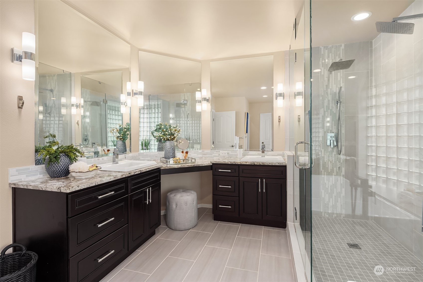 15425 192nd Court Northeast Woodinville, WA 98072 - Photo 22 of 33 a bathroom with a granite countertop sink mirror and a shower