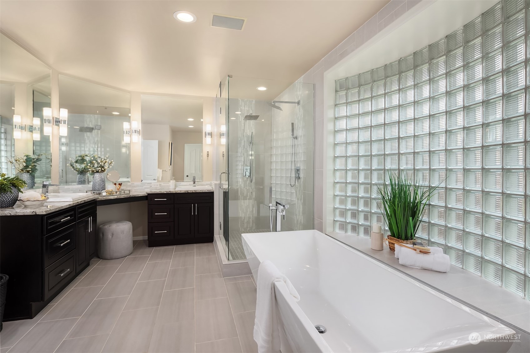 15425 192nd Court Northeast Woodinville, WA 98072 - Photo 23 of 33 a large bathroom with a large tub and sink