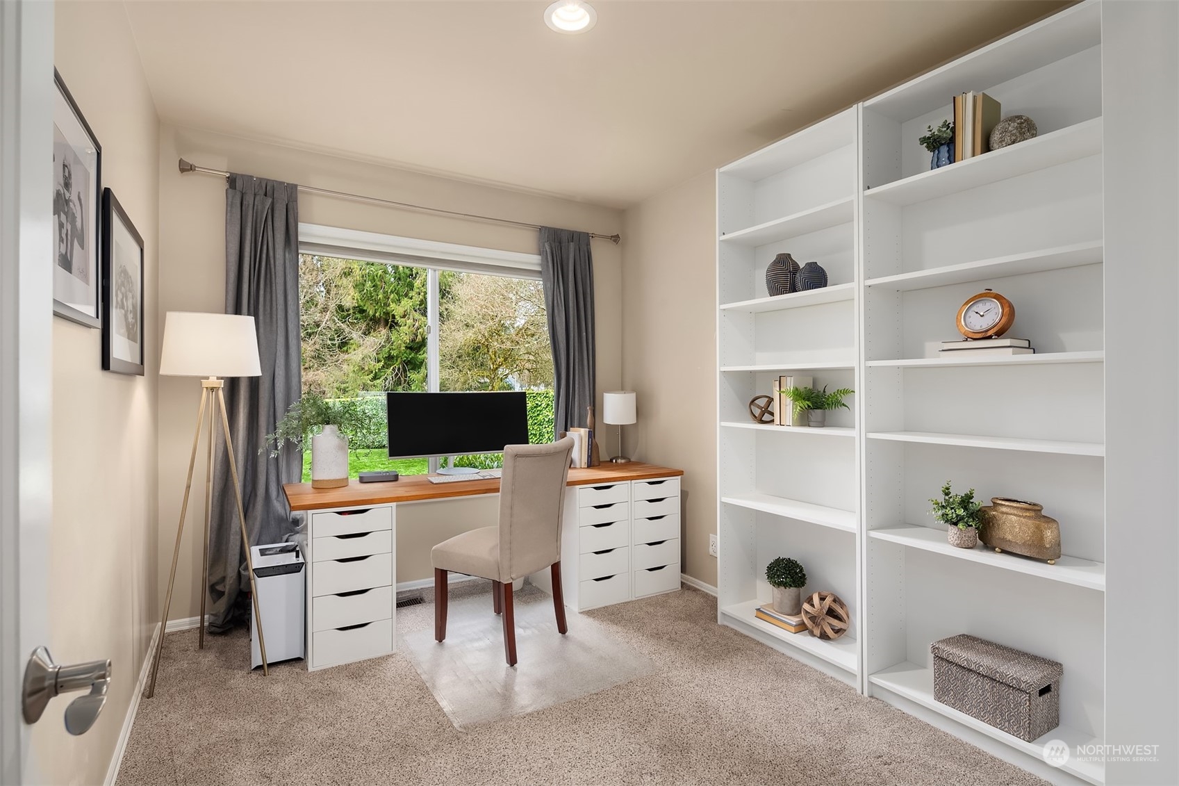 15425 192nd Court Northeast Woodinville, WA 98072 - Photo 24 of 33 a view of a workspace with furniture and a window