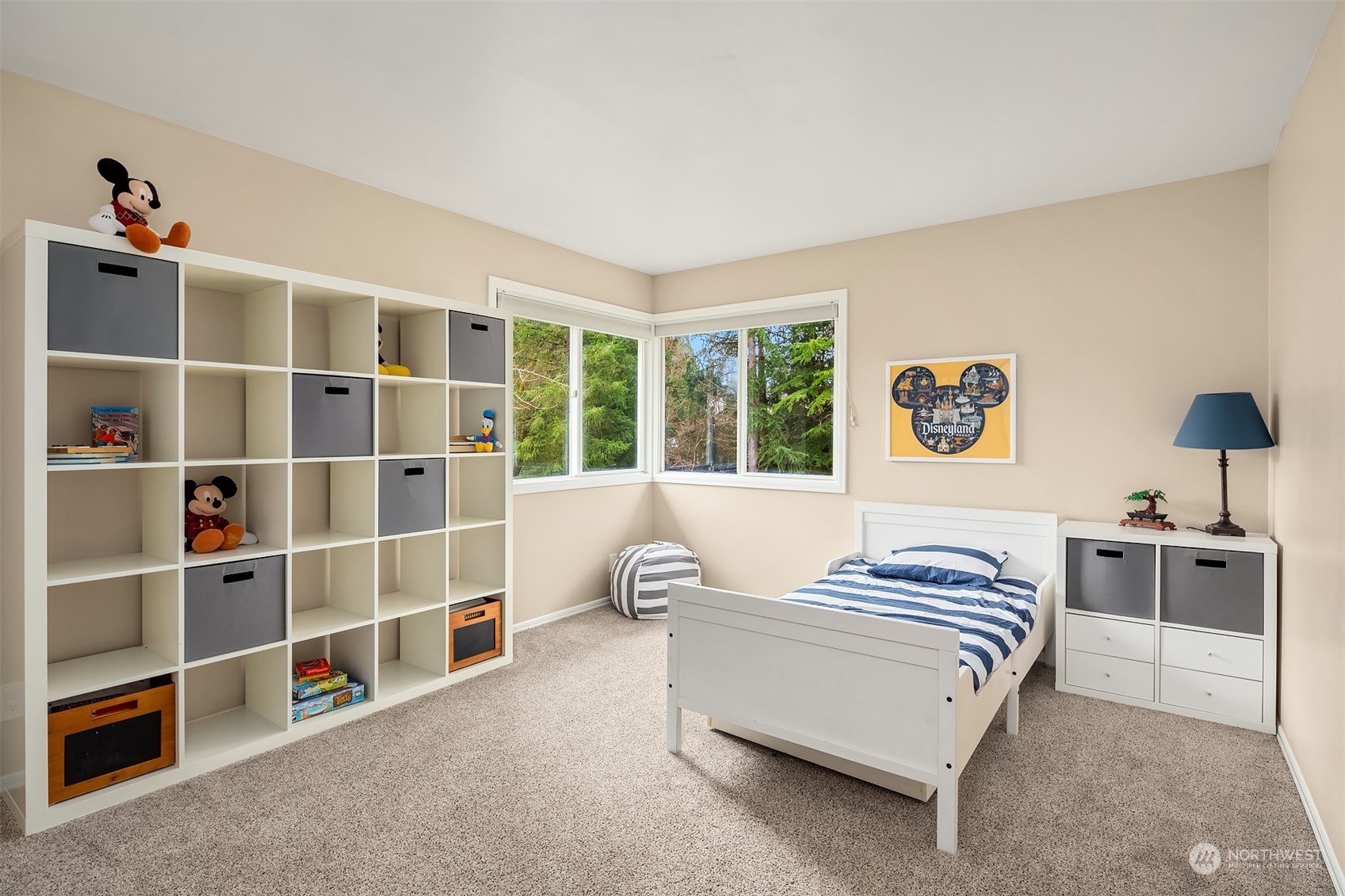 15425 192nd Court Northeast Woodinville, WA 98072 - Photo 26 of 33 a living room with furniture and a large window