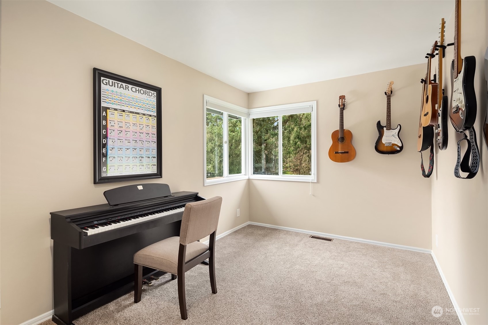 15425 192nd Court Northeast Woodinville, WA 98072 - Photo 28 of 33 a view of a workspace with furniture and a window