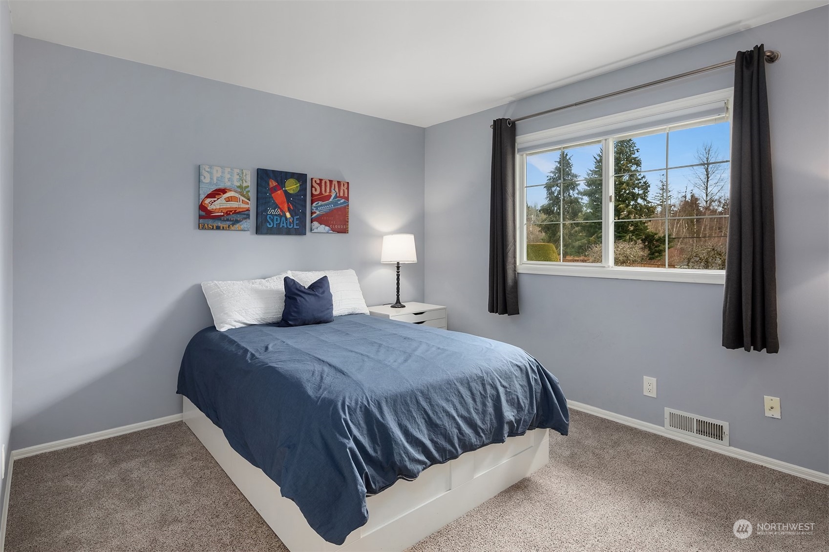 15425 192nd Court Northeast Woodinville, WA 98072 - Photo 29 of 33 a bedroom with a bed and a window