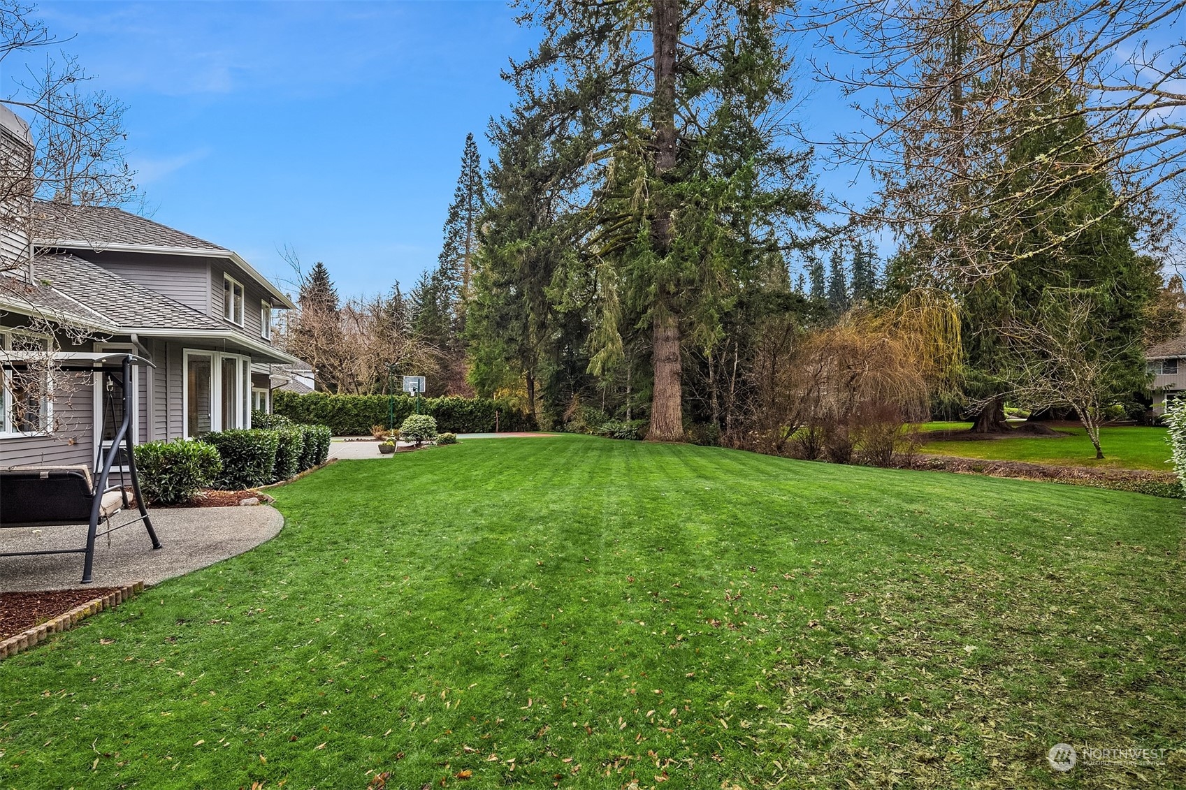 15425 192nd Court Northeast Woodinville, WA 98072 - Photo 32 of 33 a view of a house with backyard and sitting area