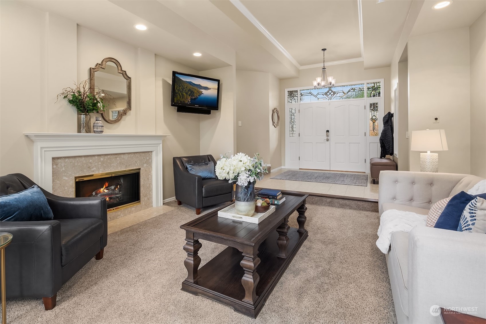 15425 192nd Court Northeast Woodinville, WA 98072 - Photo 7 of 33 a living room with furniture and a fireplace