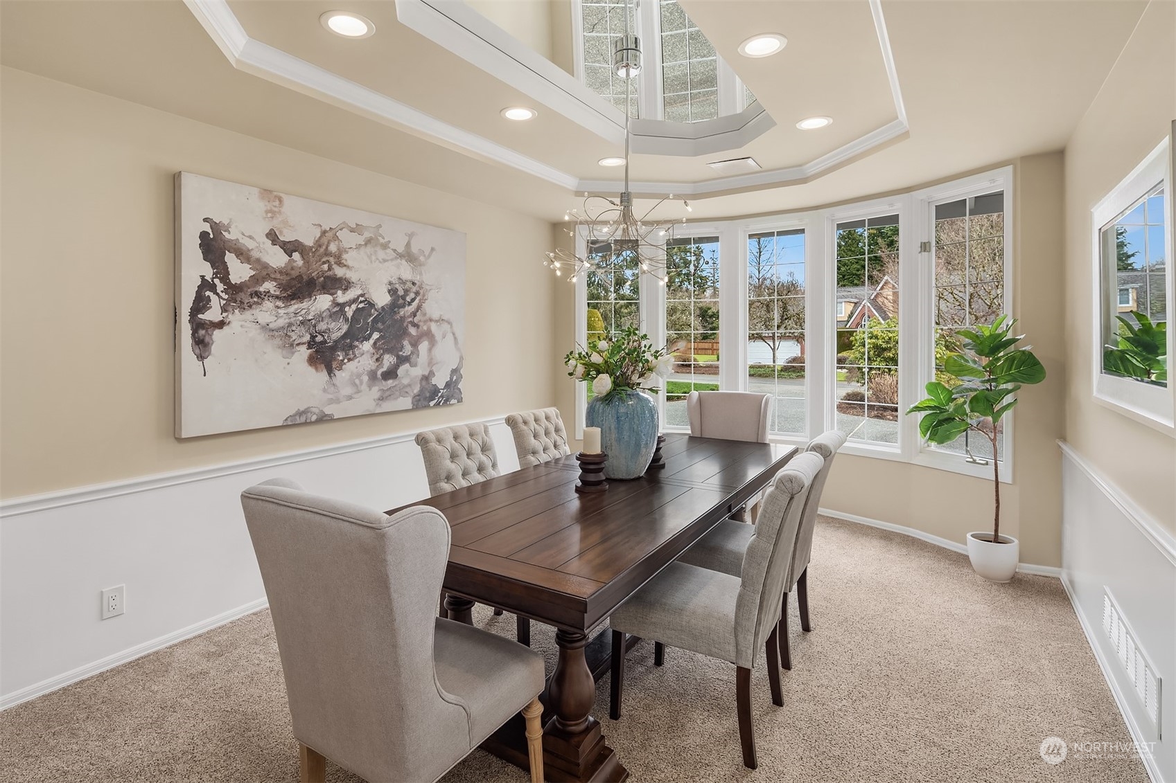 15425 192nd Court Northeast Woodinville, WA 98072 - Photo 8 of 33 a view of a dining room with furniture window and wooden floor