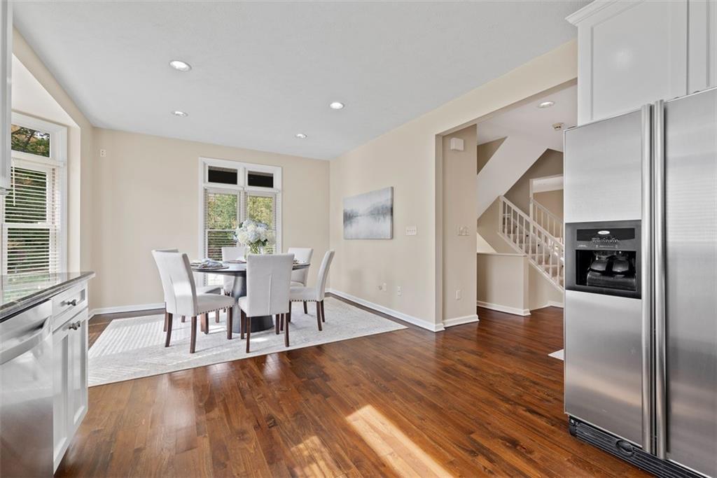7 Waterside Place Pittsburgh, PA 15222 - Photo 13 of 43 a view of a dining room with furniture window and wooden floor