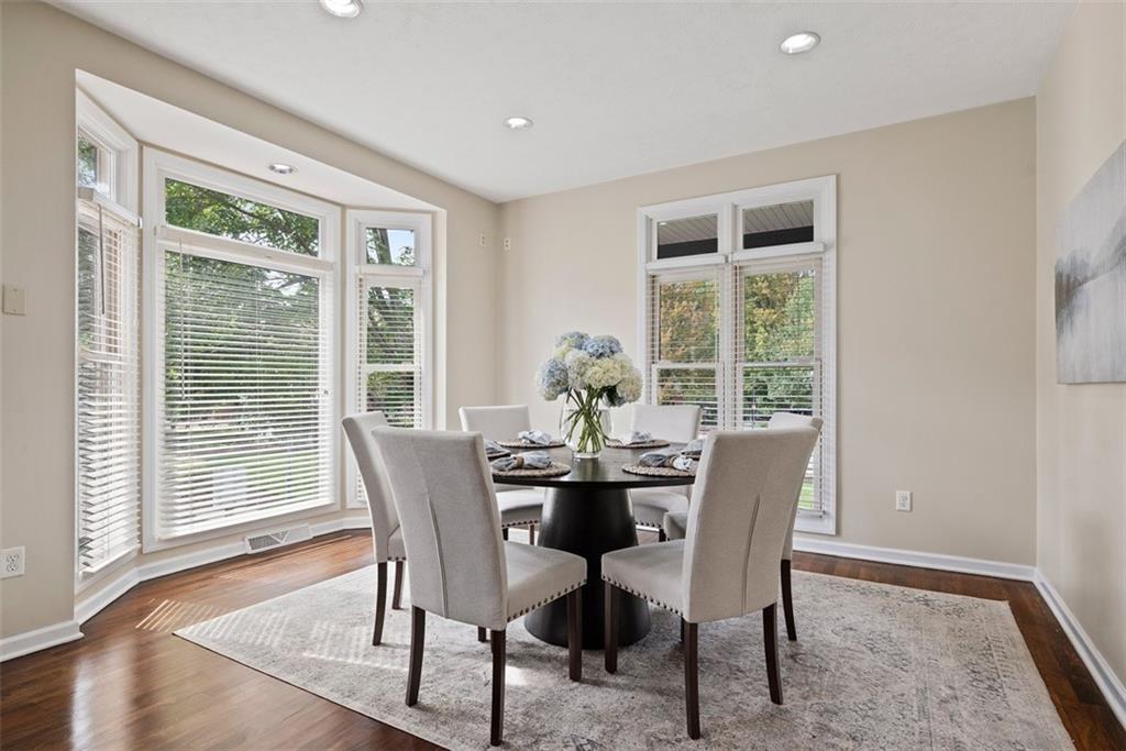7 Waterside Place Pittsburgh, PA 15222 - Photo 14 of 43 a dining room with furniture window and wooden floor